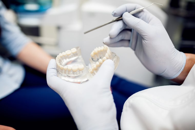 What is a dental crown at Harmony Medical Center Dubai