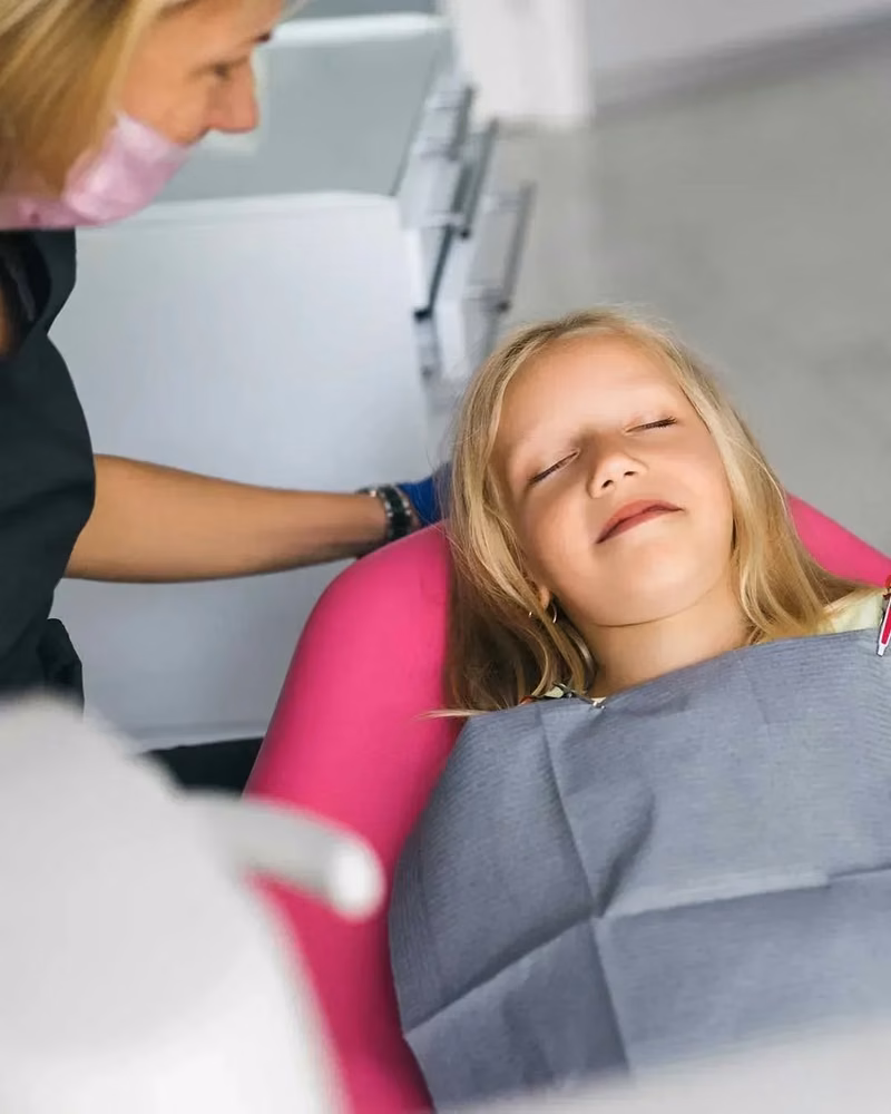 Child receiving comfortable, monitored dental care at Harmony Medical Center, Abu Dhabi