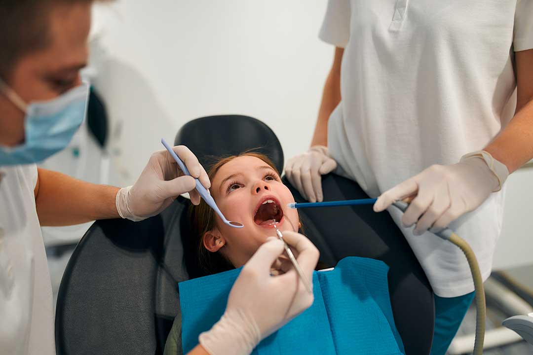 At what age should a child go to the dentist?