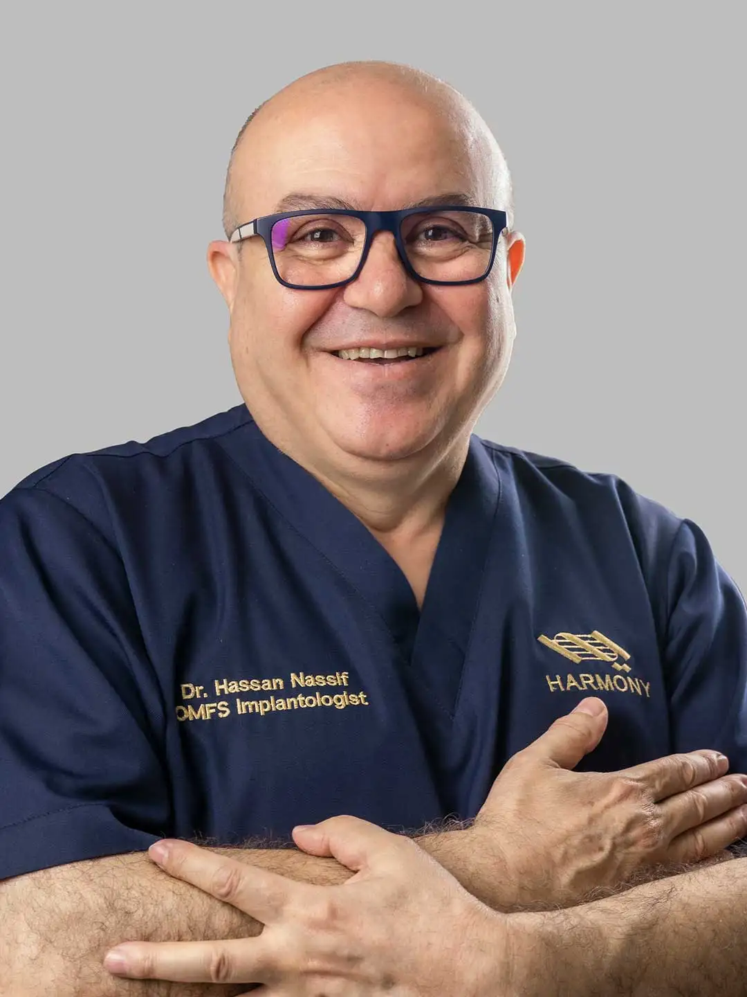 Portrait of Dr. Hassan Abdulkarim Nassif Specialist - Oral & Maxillofacial Surgeon and Implantologist Dentist at Harmony Medical Center in MBZ City, Abu Dhabi