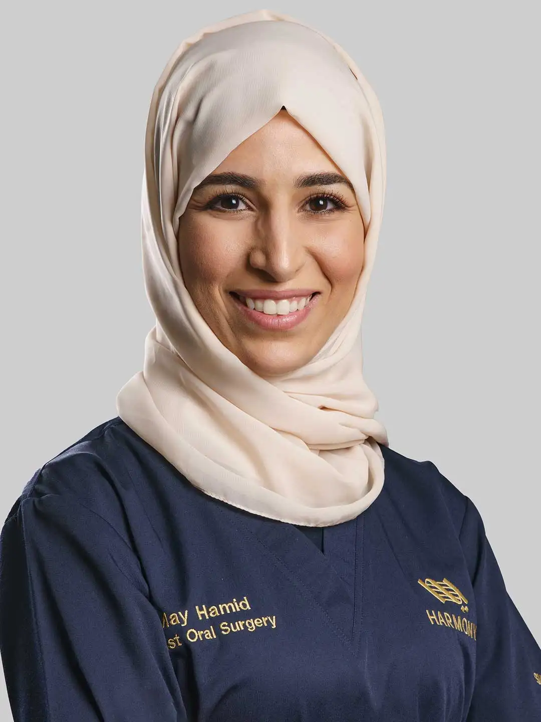 Dr. May Hamid - Specialist Oral & Maxillofacial Surgeon and Implantologist at Harmony Medical Center at MBZ City, Abu Dhabi