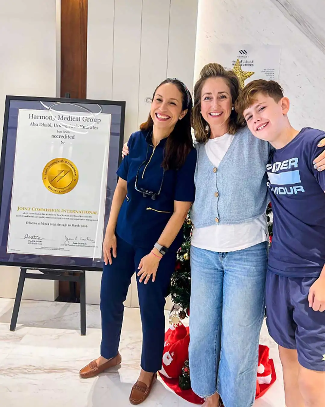 A photo of  Dr. Manuela Noia with her teen patient and the mom at Harmony Medical Center in Jumeirah