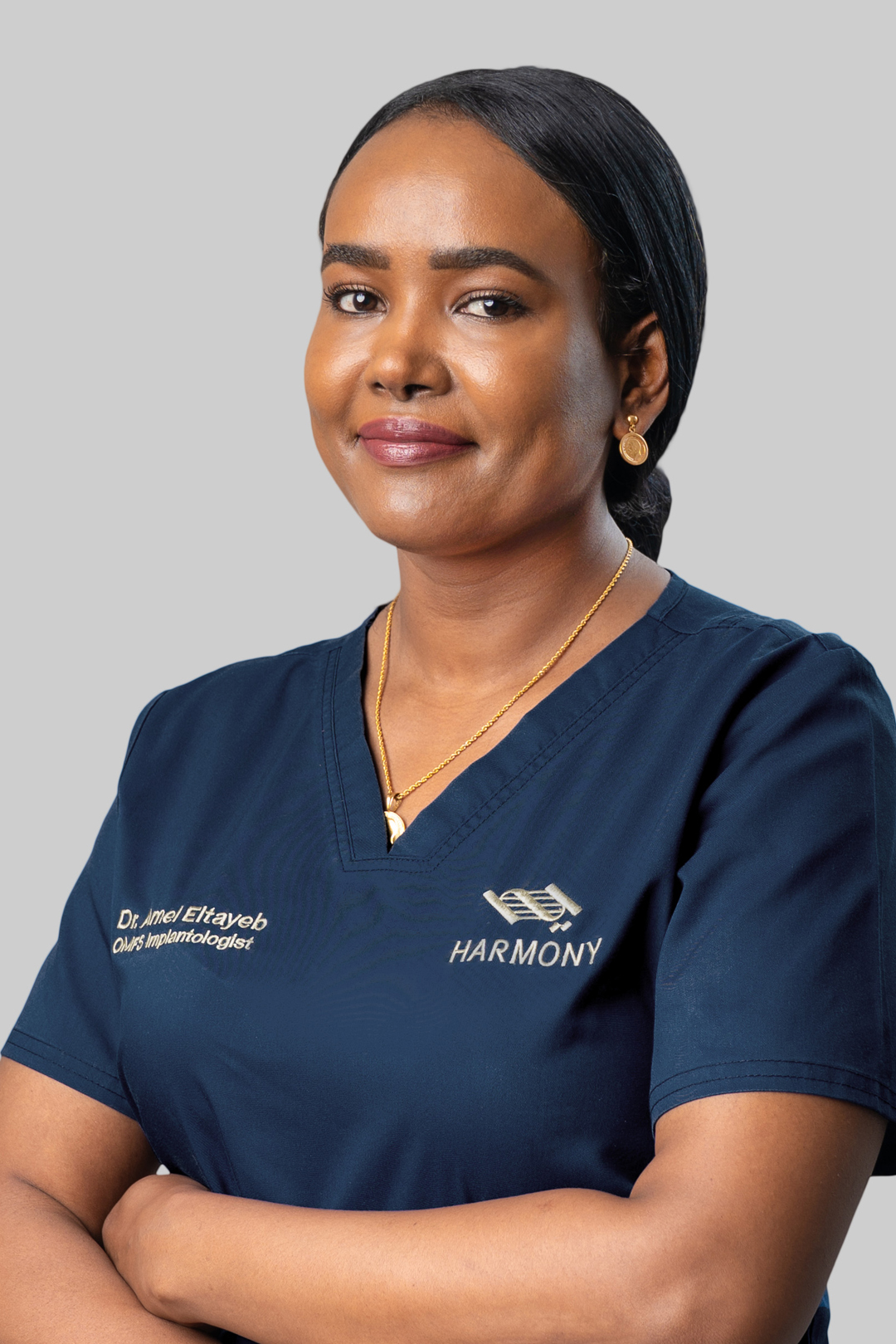 Dr. Amel Eltayeb - Oral & Maxillofacial Surgeon and Implantologist