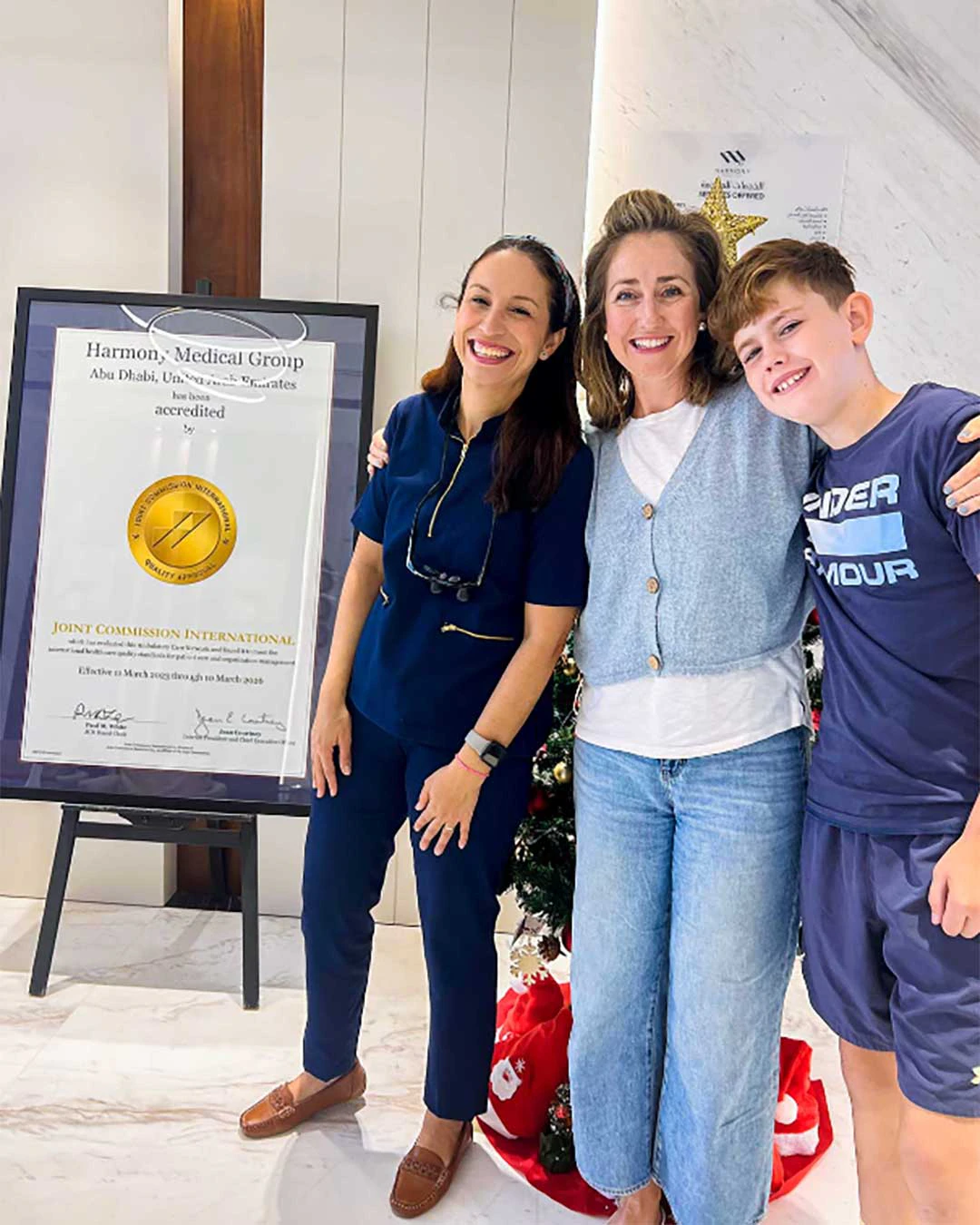 A photo of  Dr. Manuela Noia with her teen patient and the mom at Harmony Medical Center in Jumeirah